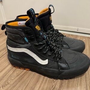 Vans Black and White High-Top Sneakers
